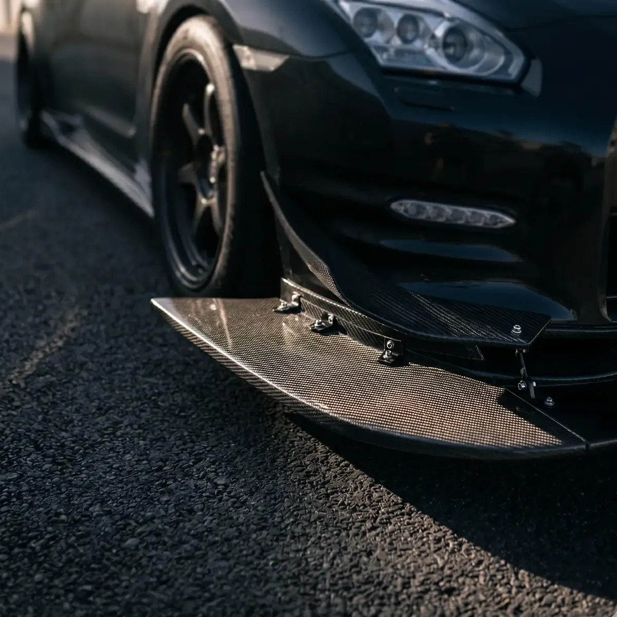 Front splitter on a performance vehicle
