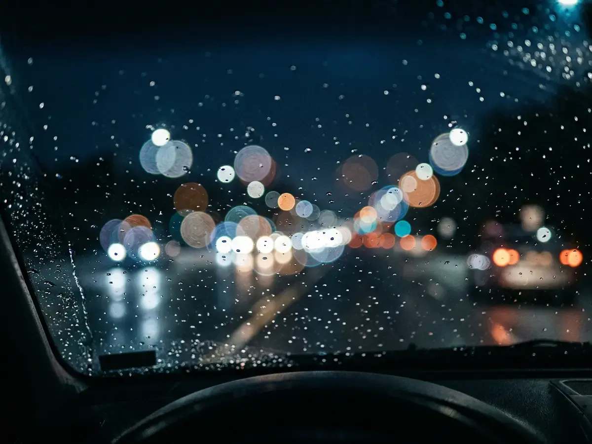 Night driving visibility through glass-coated windshield